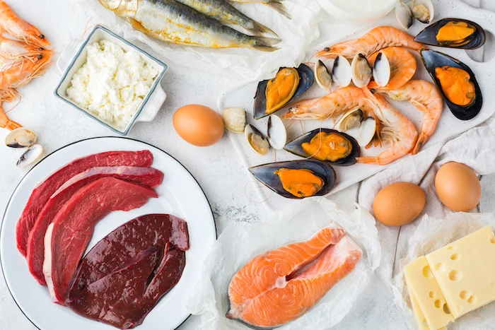 Продукти багаті на вітамін D: лосось, морепродукти, яйця та сир